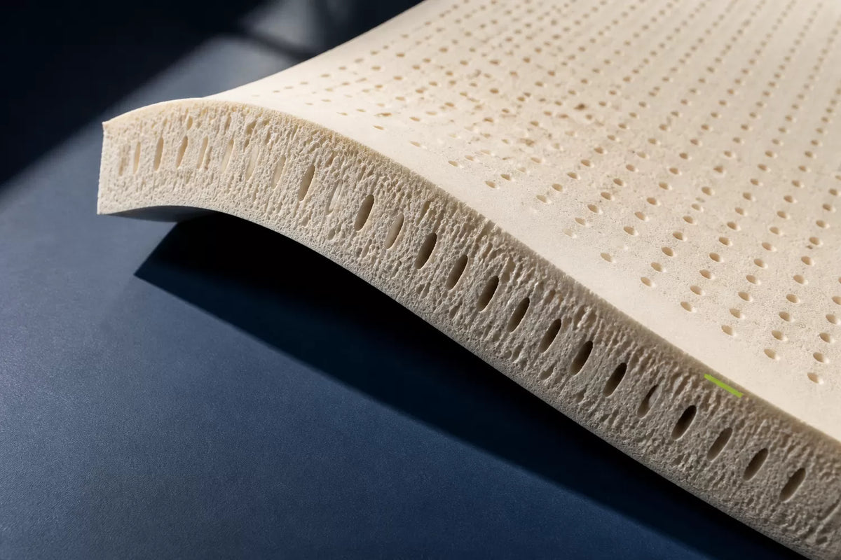 Pin-cored natural latex, photographed close up